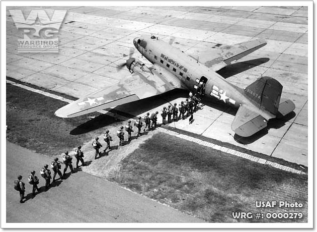  Soldiers of the Airborne School at Ft. Benning wait to climb aboard a Douglas C-47 of 75th Troop Carrier Squadron for a practice jump. WRG#: 0000279