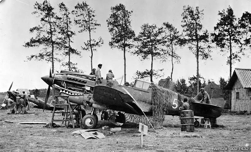 Repairing a Flying Tiger P-40 at Kunming China (US Air Force photo). WRG# 0021432