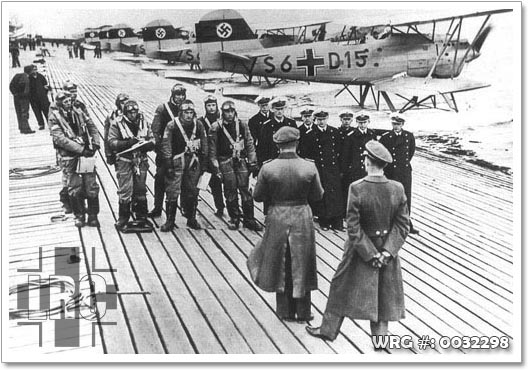 A group of He 60 crews in front of thier aircraft