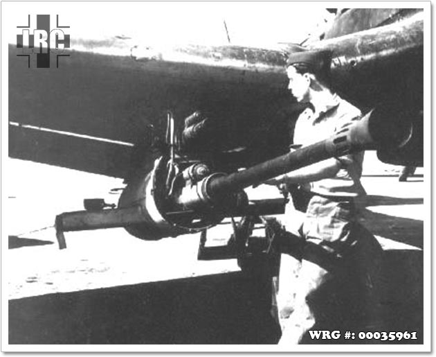 Bk 37 Bordkanone being serviced on the wing of a Junkers Ju 87G. Bk 37 Bordkanone being serviced on the wing of a Junkers Ju 87G.