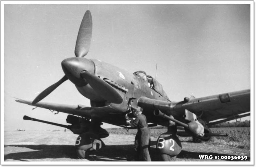 Bk 37 Bordkanone being serviced on the wing of a Junkers Ju 87G. Bk 37 Bordkanone being serviced on the wing of a Junkers Ju 87G.
