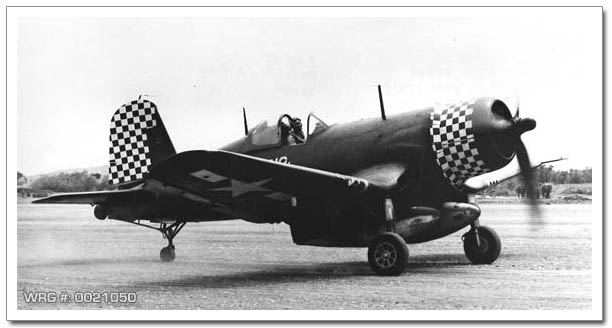 An F4U-1D Corsair of VMF 312 'Checkerboards' landing at Kadena Airfield on Okinawa on April 9, 1945 WRG# 0017588