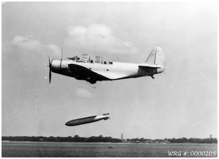 A TBD-1 Devastator releases a torpedo during a weapons test flight at Naval Air Station (NAS) Hampton Roads, Virginia, on July 25, 1937. WRG #: 0000205