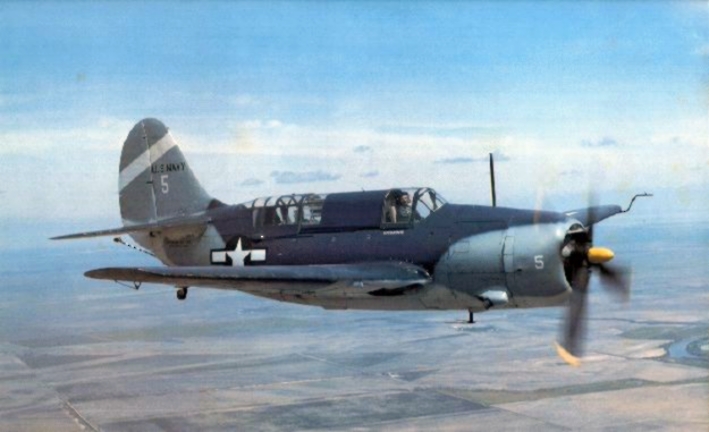 A Curtiss SB2C Helldiver in tricolour scheme and tail markings for Bombing Squadron 80 (VB-80), which operated off the aircraft carrier USS Hancock (CV-19), in February 1945.