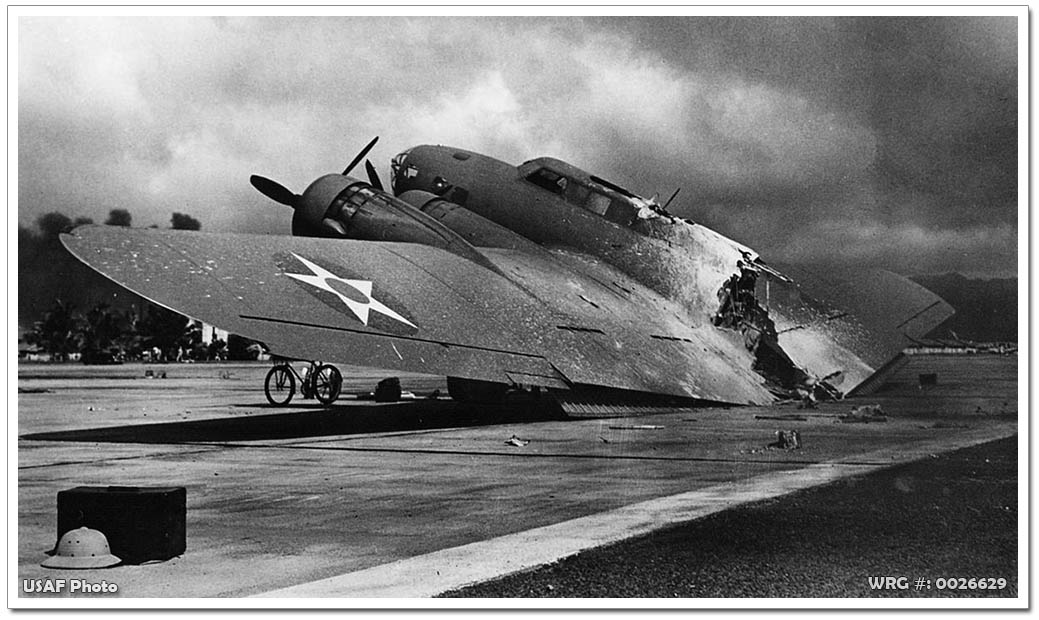 Boeing B-17C Flying Fortress/40-2074 near Hangar 5, Hickam Field, Oahu, Hawaii, on December 7, 1941. Boeing B-17C Flying Fortress/40-2074 near Hangar 5, Hickam Field, Oahu, Hawaii, on December 7, 1941.