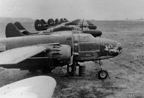 B-25 Mitchell parked with a bunch of P-61 Black Widows. WRG-0000069