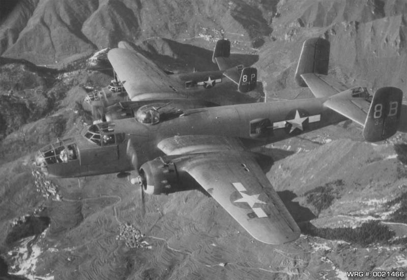 North American B-25 Mitchell's of the 340th BG, 12th AF over Italian Alps on way to target in the Brenner Pass. 1944. WRG-0021466