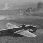 North American B-25H-10 Mitchell/43-4972 leaves a smoking target at Chauk, Burma, February 17, 1945. WRG-0021468