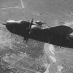North American B-25 Mitchell of the 22nd BG, 2nd BS, 5th AF bombing a railroad bridge at Changtuikwan, China, March 11, 1945. WRG-0021478