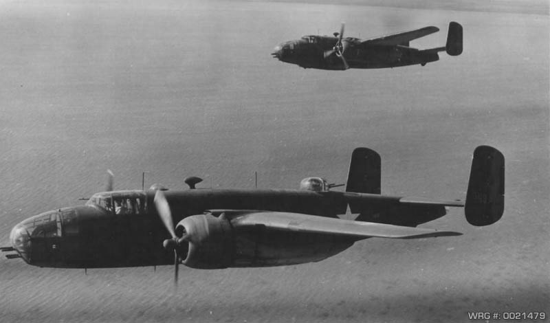 Two B-25's of the 42nd BG practice skip bombing New Caledonia, August 13, 1943. WRG-0021479