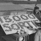12th AF, 12th BG, 434th BS members being served coffee and donuts by red cross workers 1943. WRG-0021518