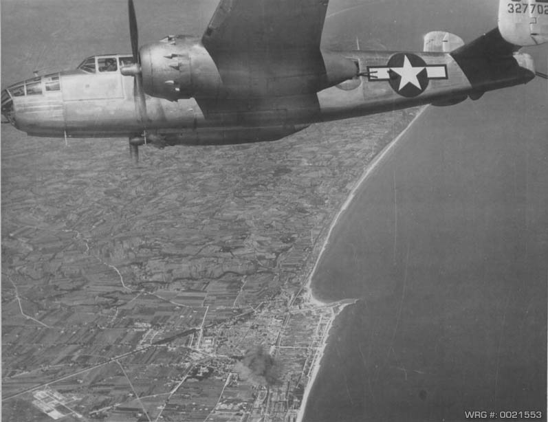 North American B-25J-1-NC Mitchell/43-27702 over the Italian coast 125 miles NE of Rome, 1944. This aircraft was later lost on July 3, 1944. WRG #: 0021553