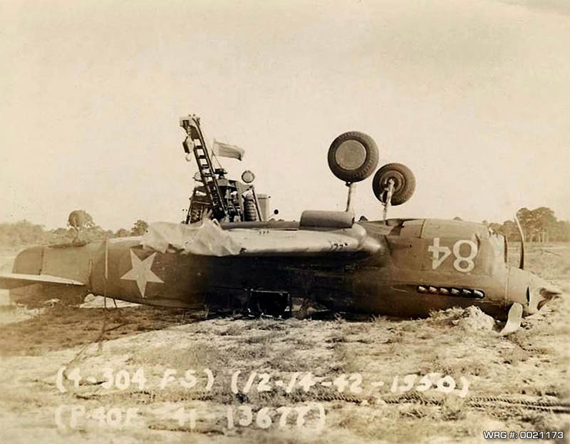 P-40F Warhawk/41-13677 of the 304th Fighter Squadron after a wheels up landing, December 14, 1942. WRG# 0021428