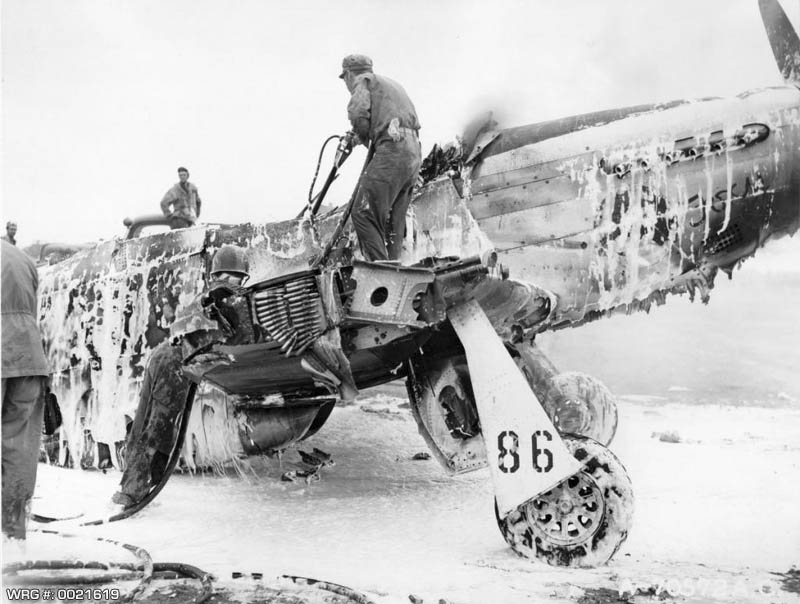 P-51D Mustang of the 45th FS, after crashing. WRG# 0021619