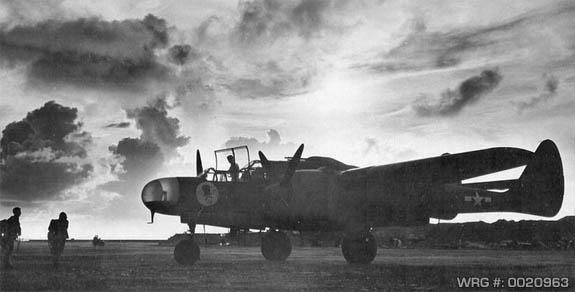 Northrop P-61A-1-NO Black Widow s/n 42-5524 of the 6th Night Fighter Squadron. Being readied for a mission, East Field, Saipan, Mariana Islands, September 1944. WRG# 0020963